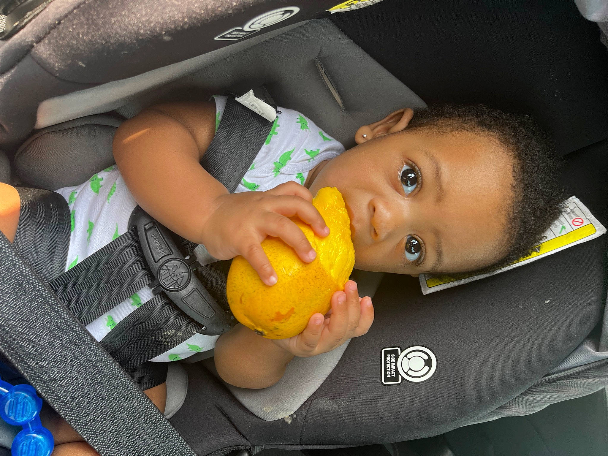 Kayden is registered to the contest to win money with this photo: auto_part, automotive_lighting, baby, baby_carriage, baby_in_car_seat, baby_products, car_seat, cheek, child, comfort, fun, happy, nail, person, personal_protective_equipment, product, skin, thumb, toddler, toy