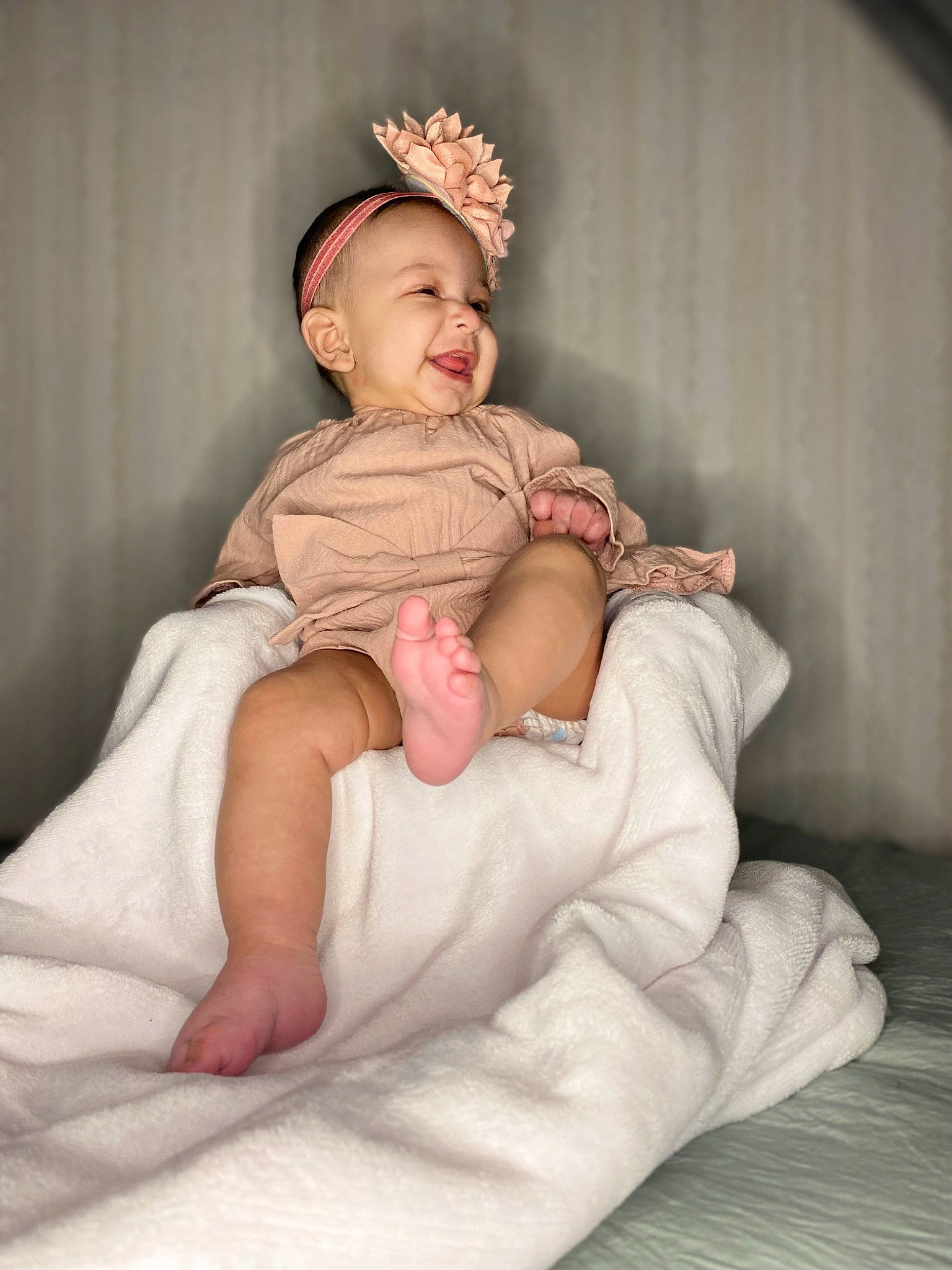 Elianna joined the competition — help win amazing prizes! baby, baby_toddler_clothing, cheek, child, chin, comfort, dress, embellishment, face, flash_photography, hair_accessory, head, headband, headpiece, human_leg, linens, person, sitting, skin, sleeve