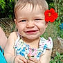 Norah participe au concours pour gagner de l'argent avec cette photo : child, toddler, smiling, flower, red_flower, outdoor, nature, greenery, person, baby, holding, leaf, summer, happy, cute, plant, portrait, dress, headwear, sunlight