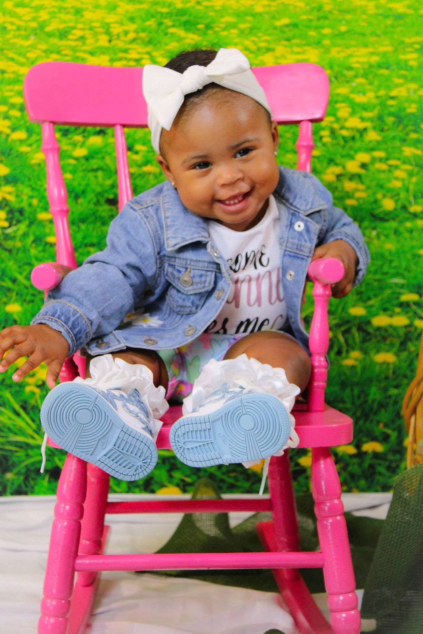 Dior is registered to the contest to win money with this photo: baby_toddler_clothing, beauty, child, fun, grass, happy, joy, leisure, magenta, outdoor_furniture, people, people_in_nature, person, photograph, pink, product, public_space, sitting, skin, smile