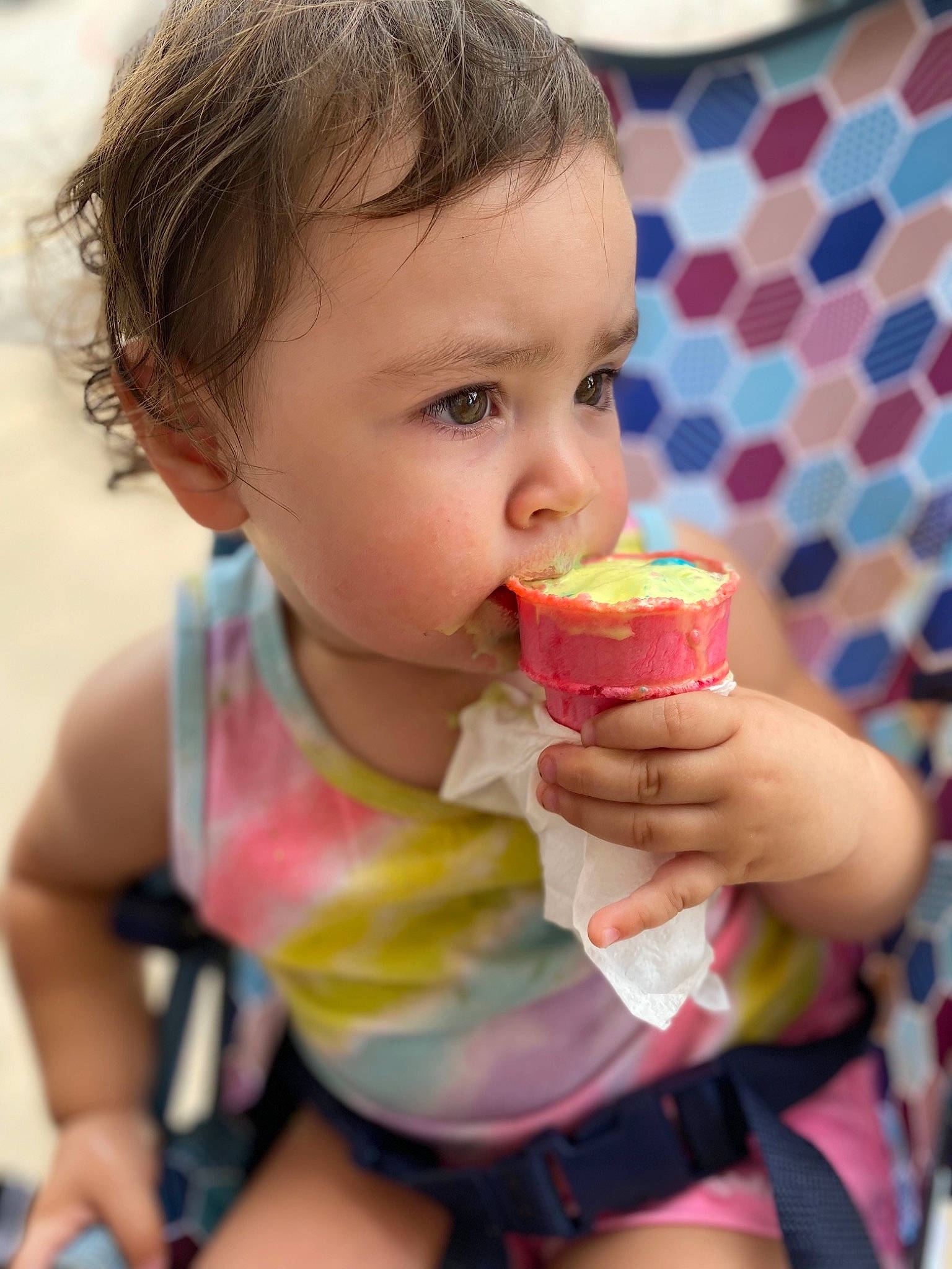 Lily is registered to the contest to win money with this photo: baby, baby_toddler_clothing, biting, cheek, child, cuisine, drinking, eating, fast_food, food, food_craving, fun, happy, junk_food, mouth, person, play, summer, sweetness, toddler