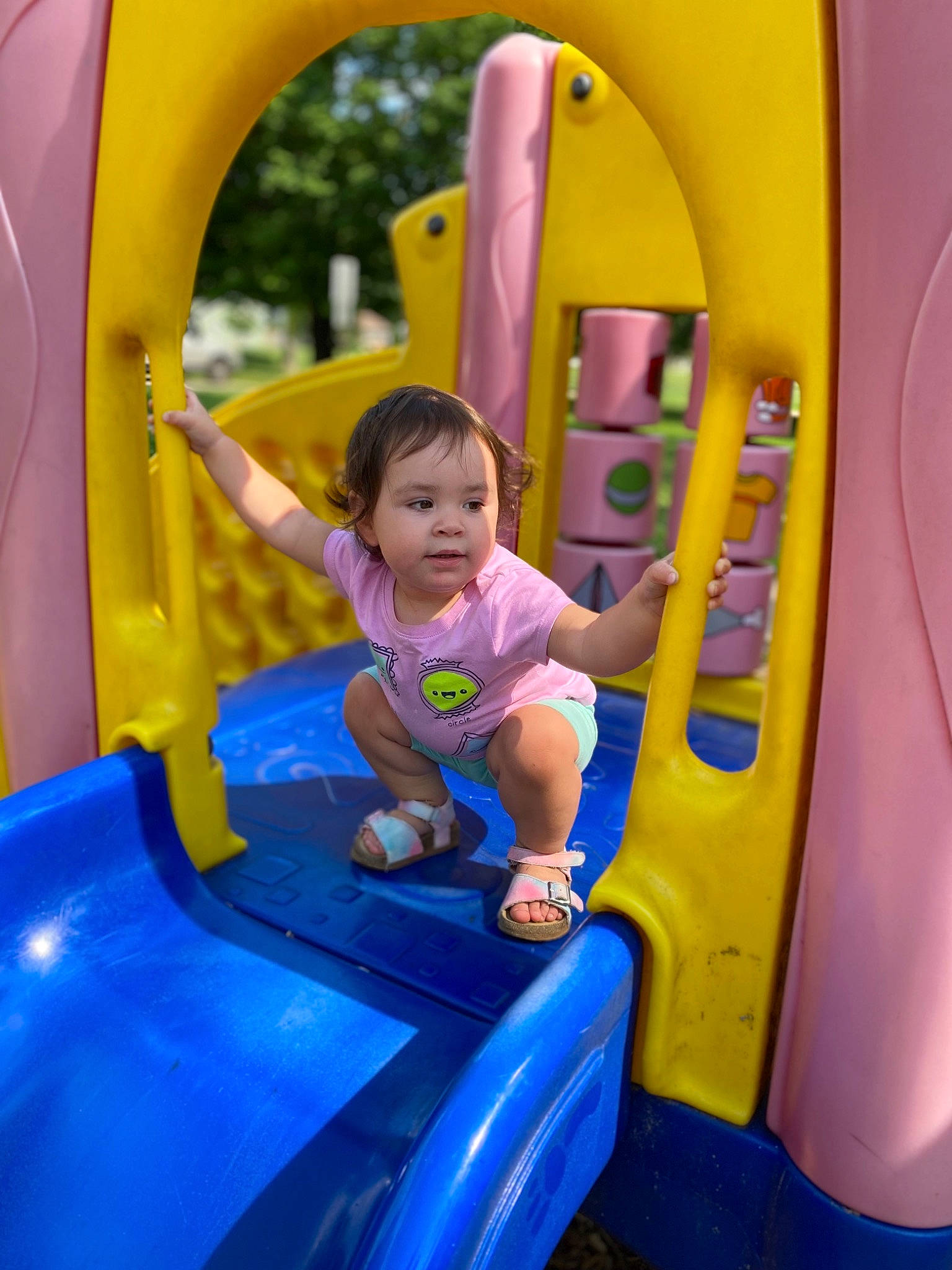 Lily joined the competition — help win amazing prizes! automotive_exterior, baby_toddler_clothing, child, chute, city, clothing, fun, green, leisure, motor_vehicle, outdoor_play_equipment, people, person, playground, purple, recreation, tire, toddler, vehicle, wheel
