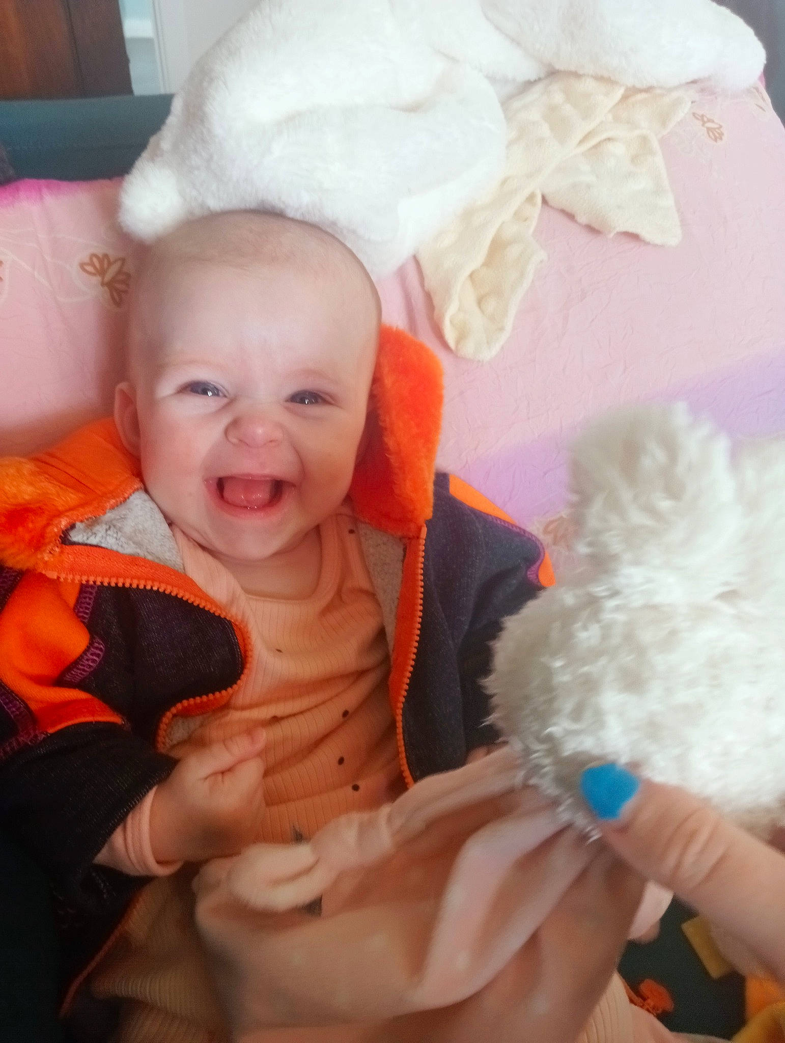 Chloe joined the competition — help win amazing prizes! baby, baby_products, baby_toddler_clothing, cheek, child, comfort, event, fashion_accessory, fun, gesture, happy, person, pink, product, sitting, skin, smile, textile, thumb, toddler