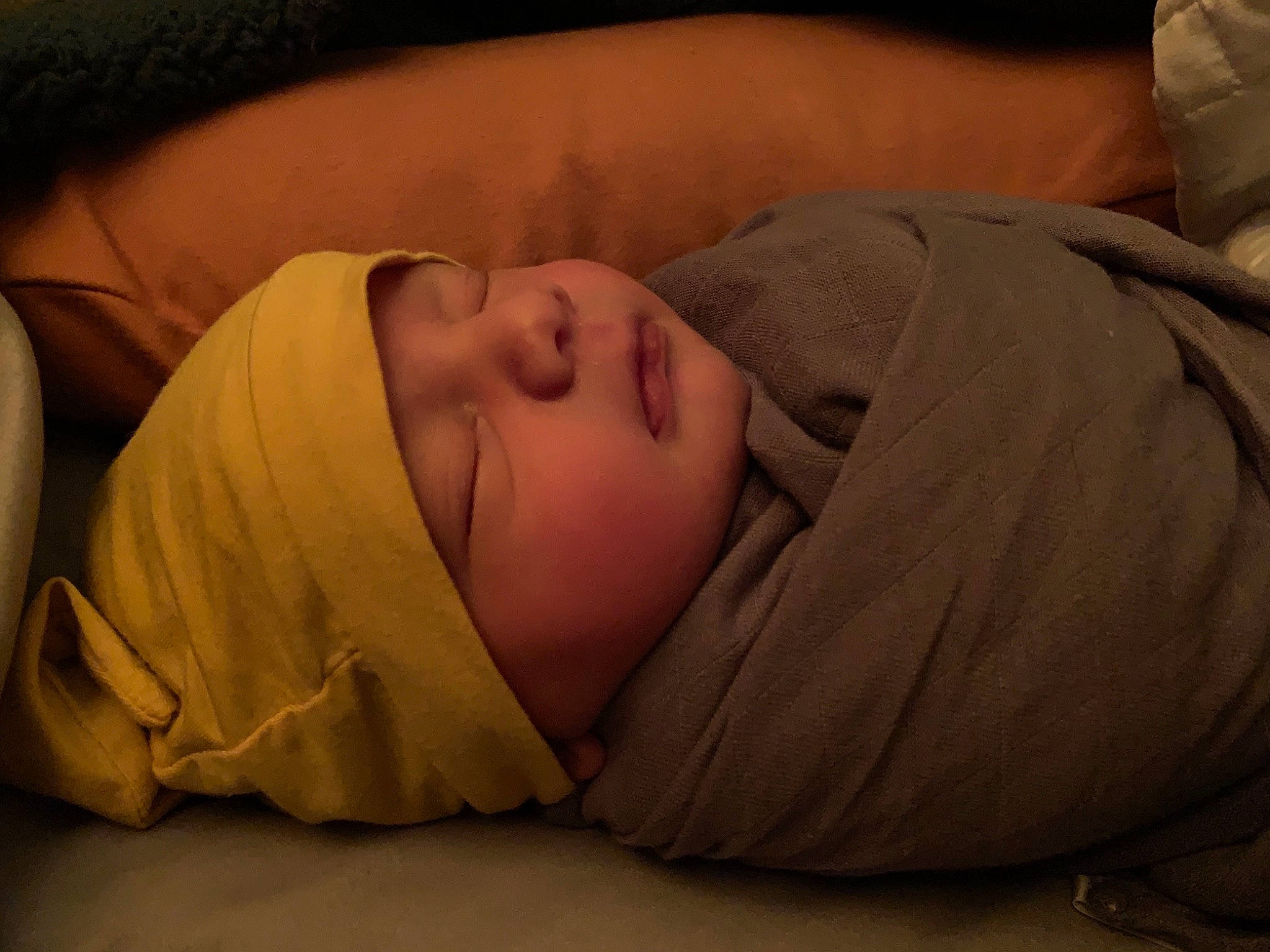 Kellen is registered to the contest to win money with this photo: baby, bedtime, cheek, child, comfort, eyebrow, grass, headwear, linens, nap, nose, person, portrait_photography, room, sleep, textile, tints_and_shades, toddler, wood