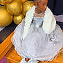 Toothfairy Daughter is registered to the contest to win money with this photo: child, girl, dress, gloves, tiara, balloons, golden_balloons, stairs, wooden_floor, updo_hairstyle, formal_wear, white_shawl, socks, shoes, portrait, indoor, party, celebration, elegant, festive
