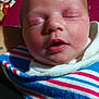Paisley is registered to the contest to win money with this photo: newborn, baby, sleeping, blanket, striped_blanket, close_up, face, infant, peaceful, indoors, child, wrapped, soft_lighting, portrait, human, skin, head, mouth, nose, closed_eyes
