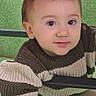 Alone a rejoint le concours — aidez-le/la à gagner de superbes lots ! toddler, child, face, eyes, sweater, striped_clothing, knitted, curious, indoor, playful, green_background, person, crawling, baby, cute, smiling, portrait, young_child, looking, bar