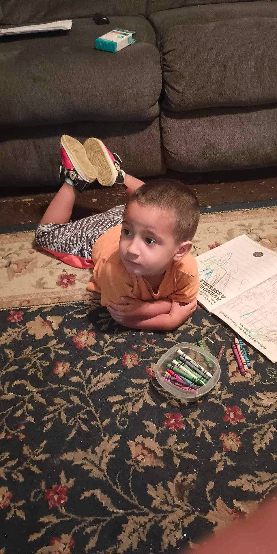 Elijah is registered to the contest to win money with this photo: baby, baseball_cap, cap, carpet, child, comfort, crawling, fedora, floor, flooring, fun, hat, head, linens, person, sitting, smile, sun_hat, t_shirt, toddler