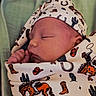 newborn, baby, sleeping, infant, blanket, hat, cowboy_theme, pattern, cactus, horse, boot, face, peaceful, wrapped, cute, soft, closeup, indoors, portrait, child