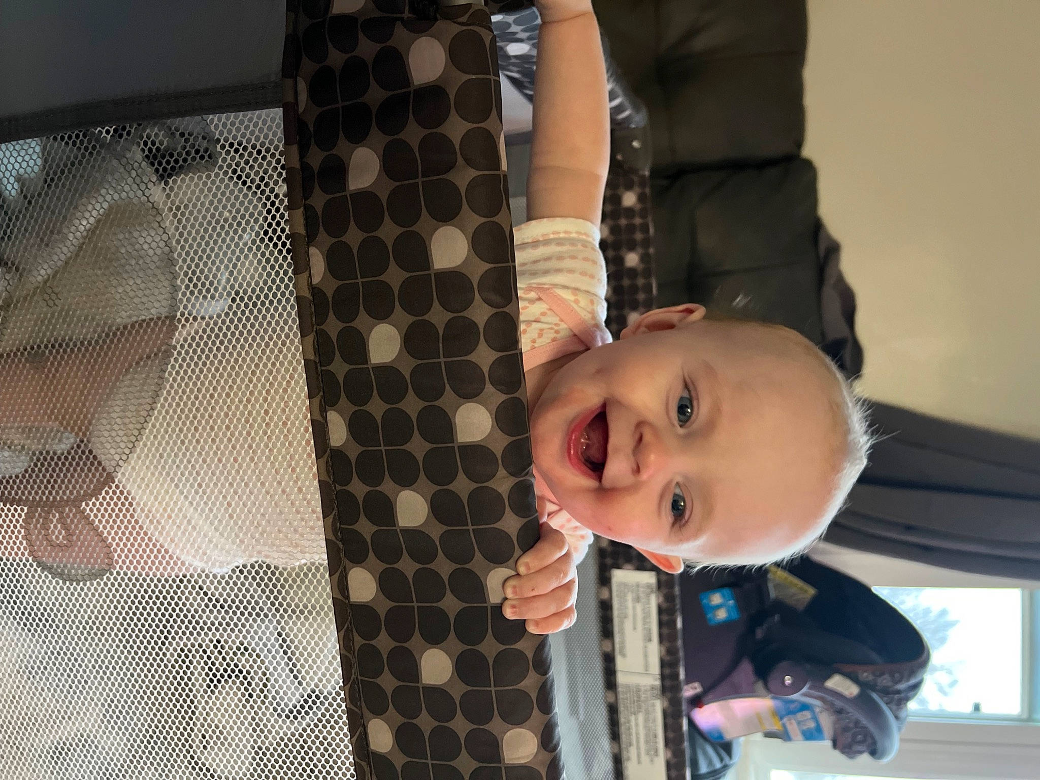 Kinsley joined the competition — help win amazing prizes! baby, baby_products, child, elbow, flash_photography, flooring, fun, happy, joy, laugh, leisure, mesh, pattern, person, plaid, recreation, room, sitting, smile, toddler
