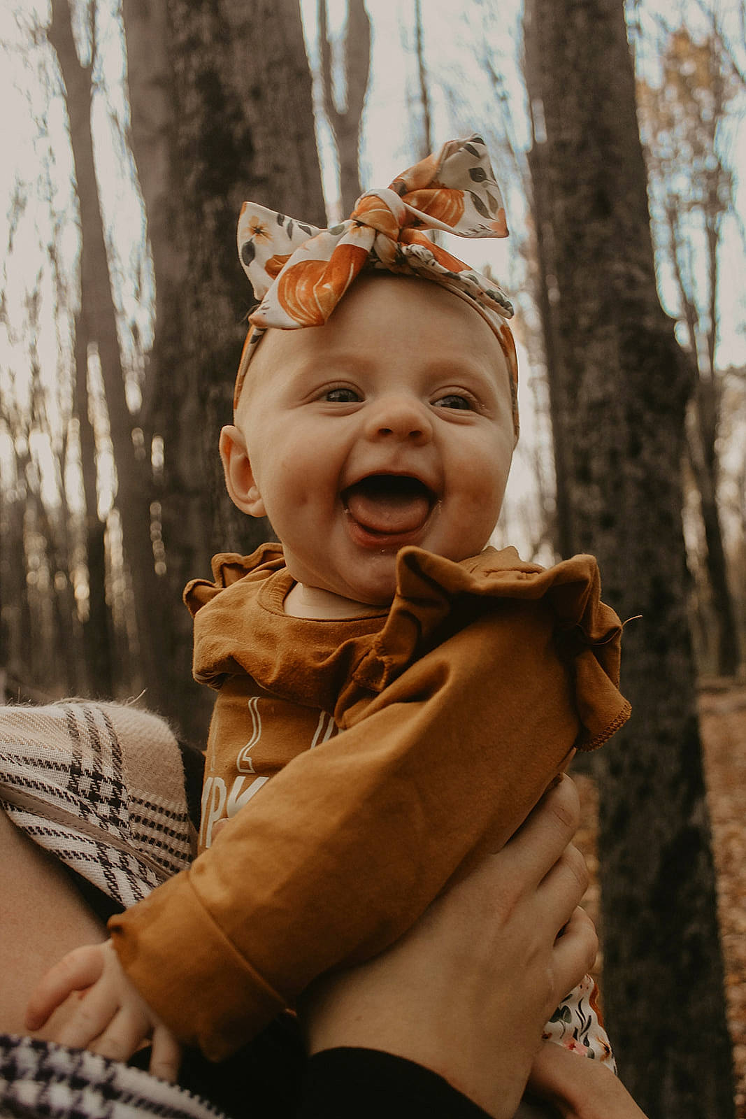 Kinsley joined the competition — help win amazing prizes! baby, blond, child, eye, fawn, fun, grass, happy, laugh, leisure, people_in_nature, person, portrait_photography, recreation, sitting, skin, smile, toddler, tree, winter
