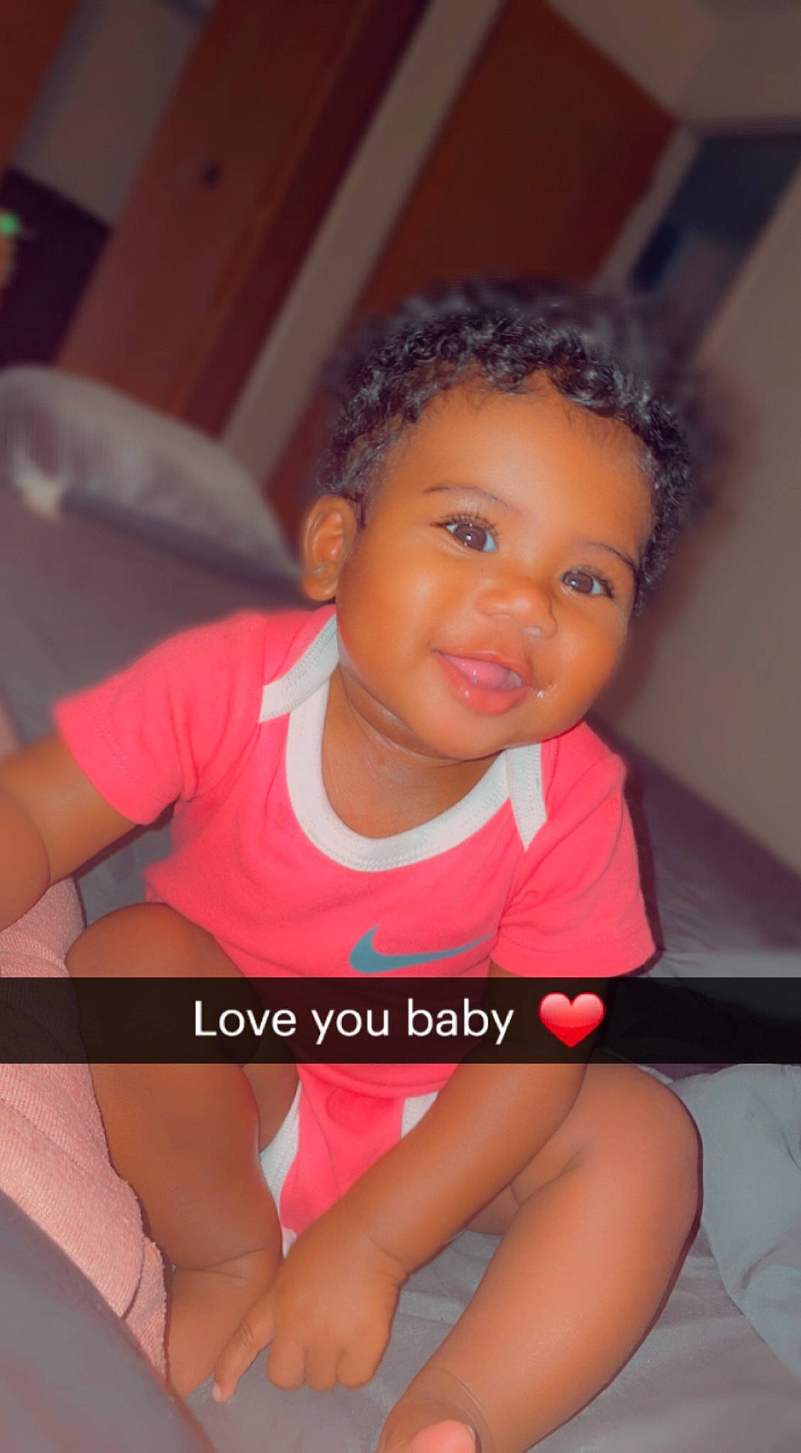 Kelsie is registered to the contest to win money with this photo: arm, baby_toddler_clothing, black_hair, cheek, chin, cool, eye, eyebrow, eyelash, finger, flash_photography, happy, joint, joy, leg, muscle, person, pink, skin, smile