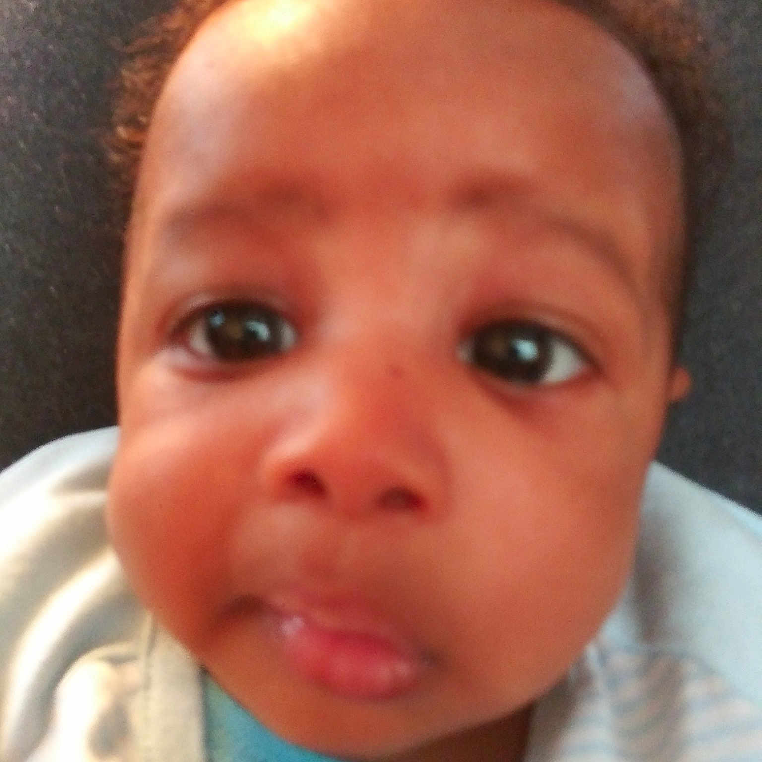 Kingdom is registered to the contest to win money with this photo: baby, cheek, child, chin, close_up, eye, eyebrow, face, facial_expression, forehead, hair, head, iris, lip, mouth, nose, person, selfie, skin, smile