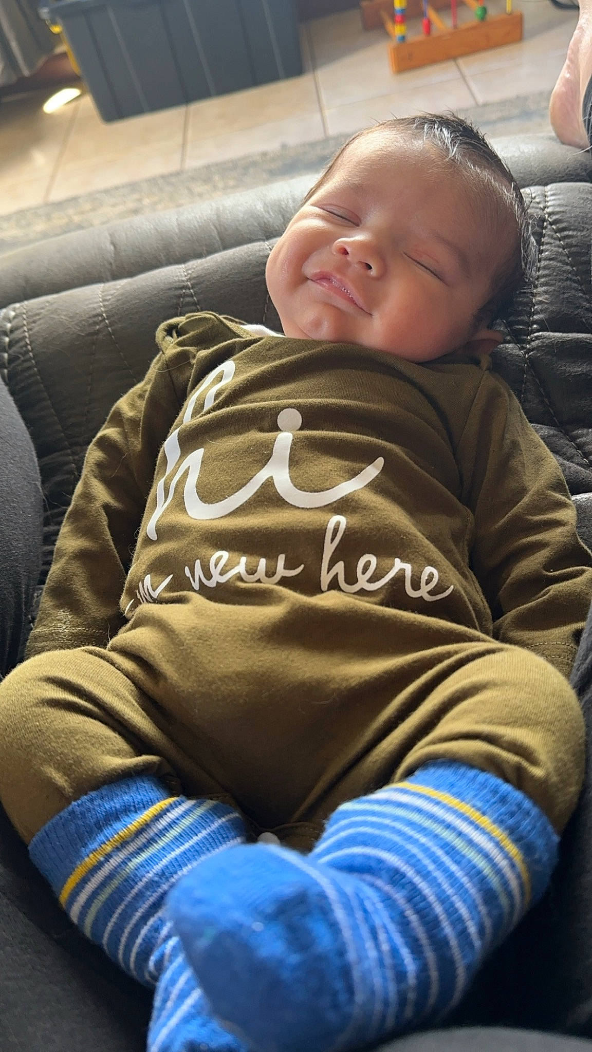 Fisher is registered to the contest to win money with this photo: baby, baby_toddler_clothing, beauty, car_seat, cheek, child, comfort, fun, hair, happy, head, human, mammal, people, person, sitting, skin, sleeve, smile, tints_and_shades