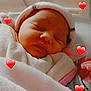 Saphira a rejoint le concours — aidez-le/la à gagner de superbes lots ! newborn, baby, sleeping, blanket, hat, crib, indoors, soft_fabric, pink, heart_emoji, cute, infant, peaceful, wrapped, cozy, resting, child, closeup, person, toddler