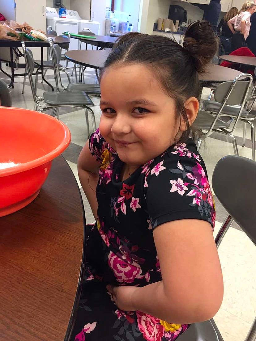 Reyna joined the competition — help win amazing prizes! black_hair, chair, child, chin, community, event, fun, furniture, hairstyle, happy, human, joy, leisure, long_hair, mammal, person, sitting, smile, summer, t_shirt