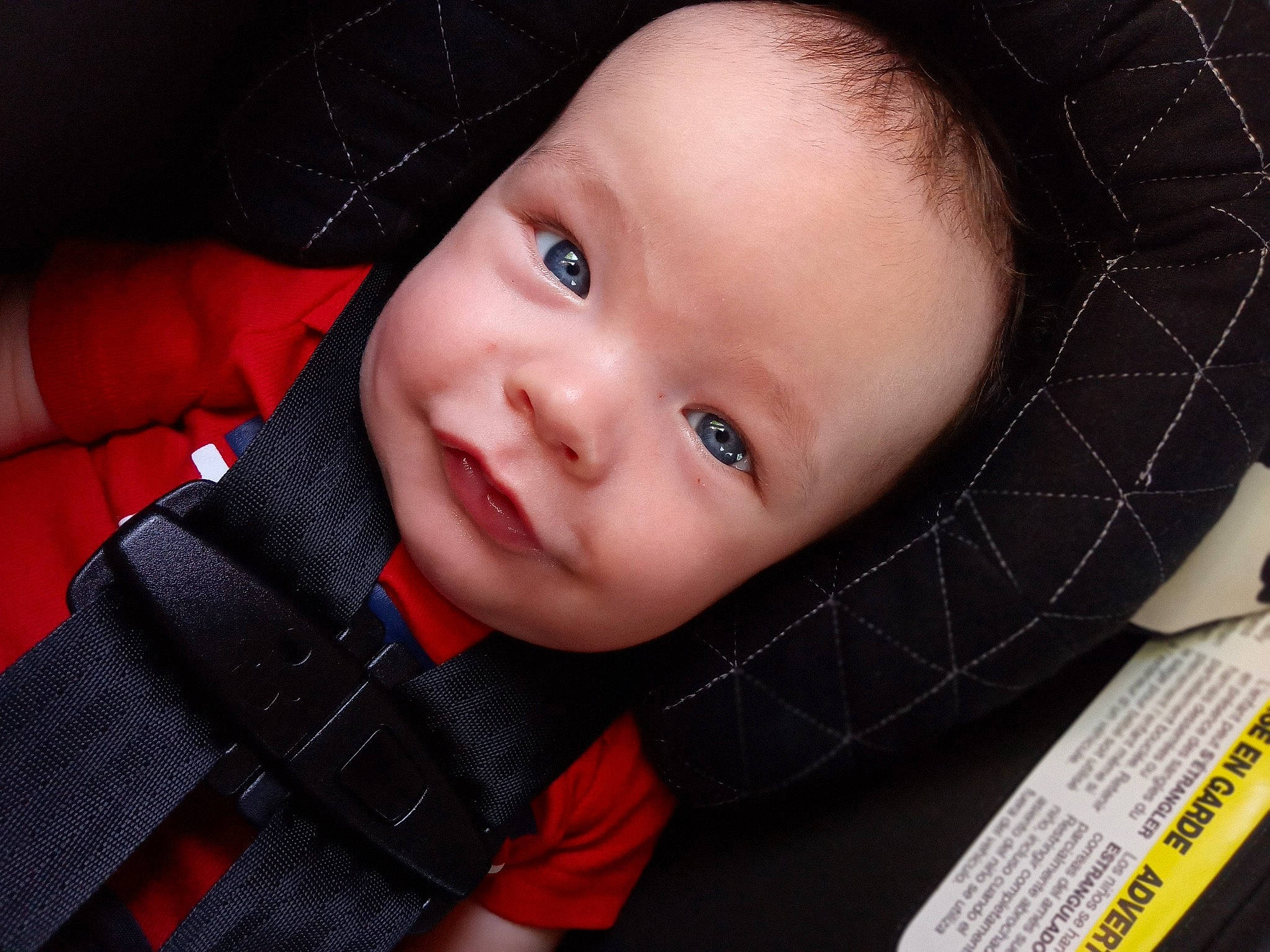 Braylon is registered to the contest to win money with this photo: baby, baby_toddler_clothing, cheek, child, chin, comfort, eyebrow, face, facial_expression, flash_photography, iris, lip, mammal, nose, person, plaid, skin, sleeve, smile, tartan