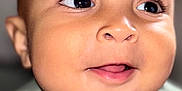 Xavier a rejoint le concours — aidez-le/la à gagner de superbes lots ! baby, child, face, smile, drool, eyes, portrait, closeup, tshirt, text, expression, cute, young, skin, head, infant, person, indoors, happy, clothing