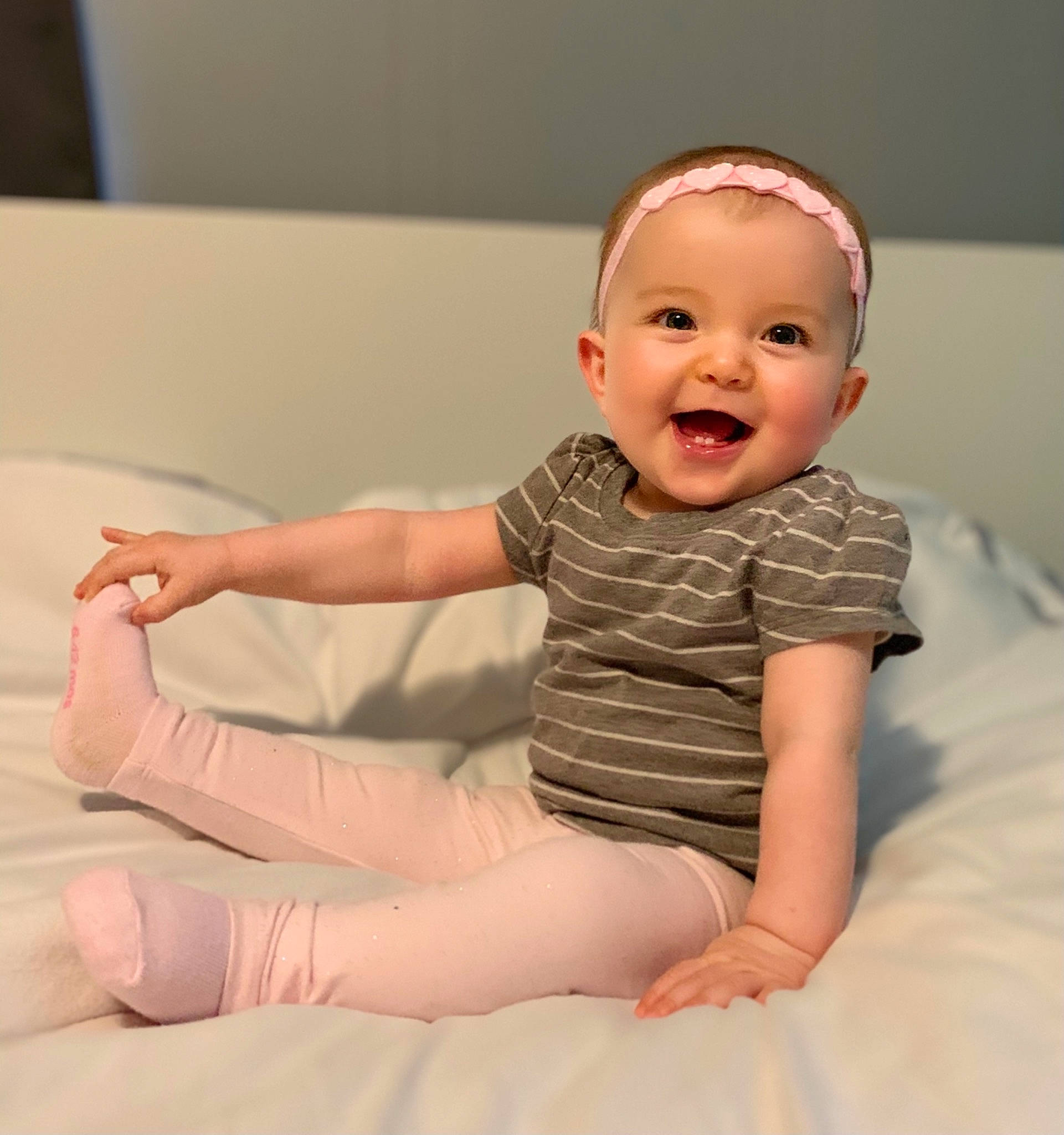 Ella joined the competition — help win amazing prizes! baby, baby_toddler_clothing, cheek, comfort, floor, flooring, gesture, happy, human_body, joint, knee, leg, lip, mouth, neck, person, shoulder, skin, sleeve, smile