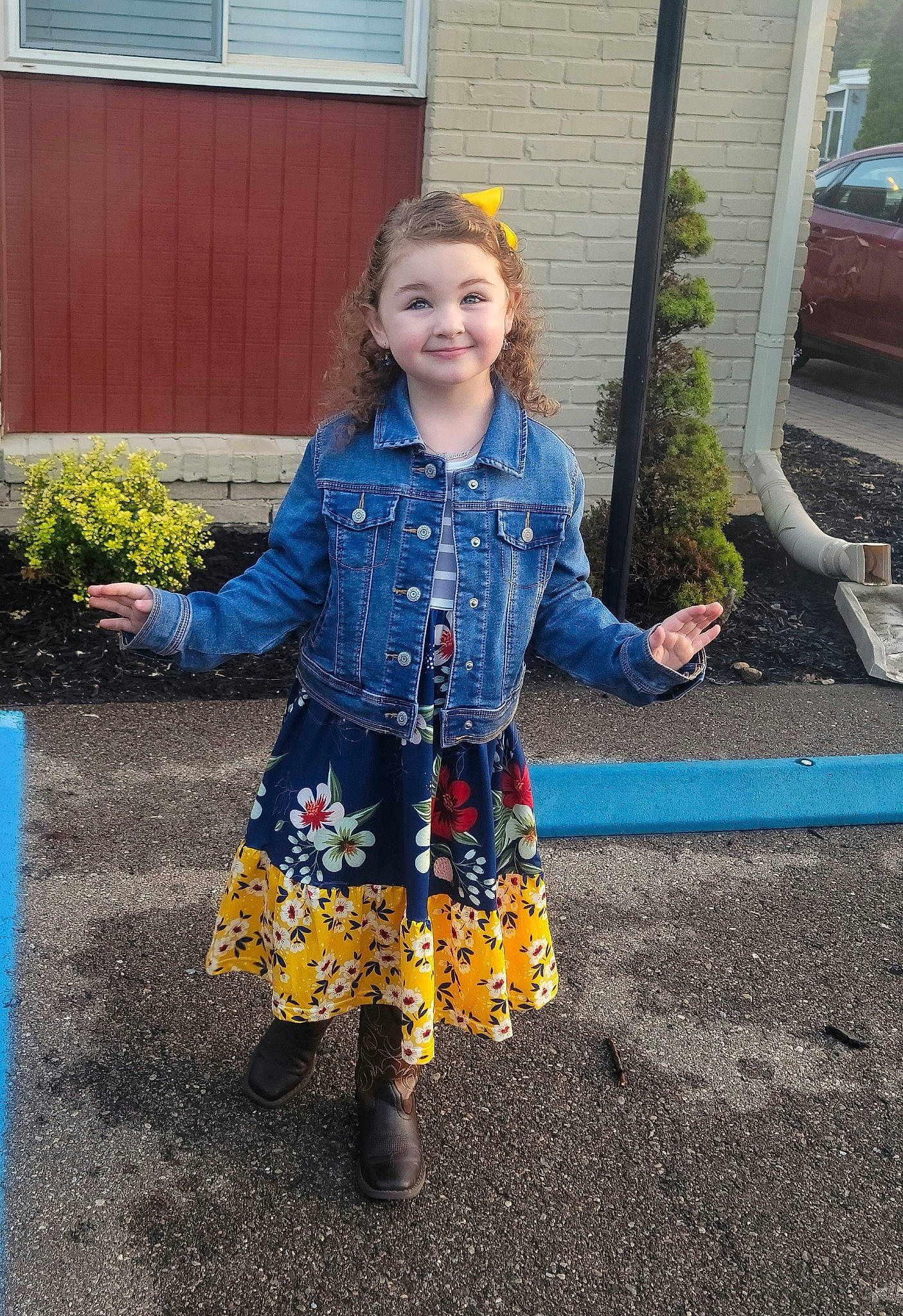 Chasity is registered to the contest to win money with this photo: asphalt, denim, electric_blue, face, fun, grass, hairstyle, happy, jacket, joy, people_in_nature, person, plant, sleeve, smile, standing, street_fashion, textile, toddler, waist