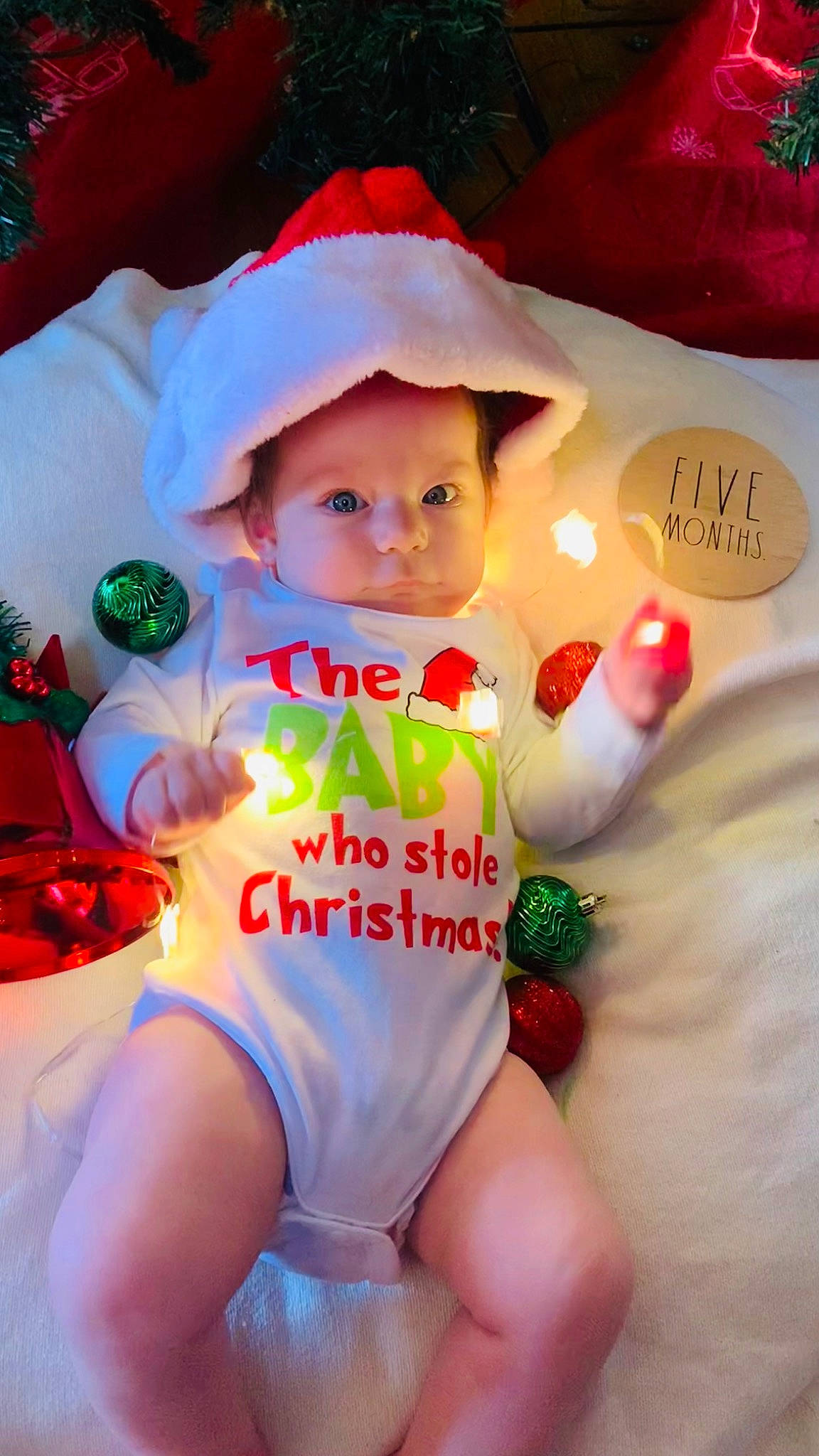 Saylem is registered to the contest to win money with this photo: baby_toddler_clothing, beauty, child, christmas_ornament, doll, event, fictional_character, font, gesture, happy, hat, headwear, holiday, human_leg, mammal, nail, person, pink, stuffed_toy, thigh