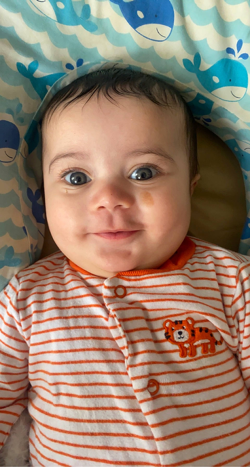 Amari is registered to the contest to win money with this photo: baby, baby_toddler_clothing, blue, cheek, chin, eye, eyebrow, eyelash, face, facial_expression, forehead, head, iris, lip, mouth, nose, organ, person, skin, sleeve