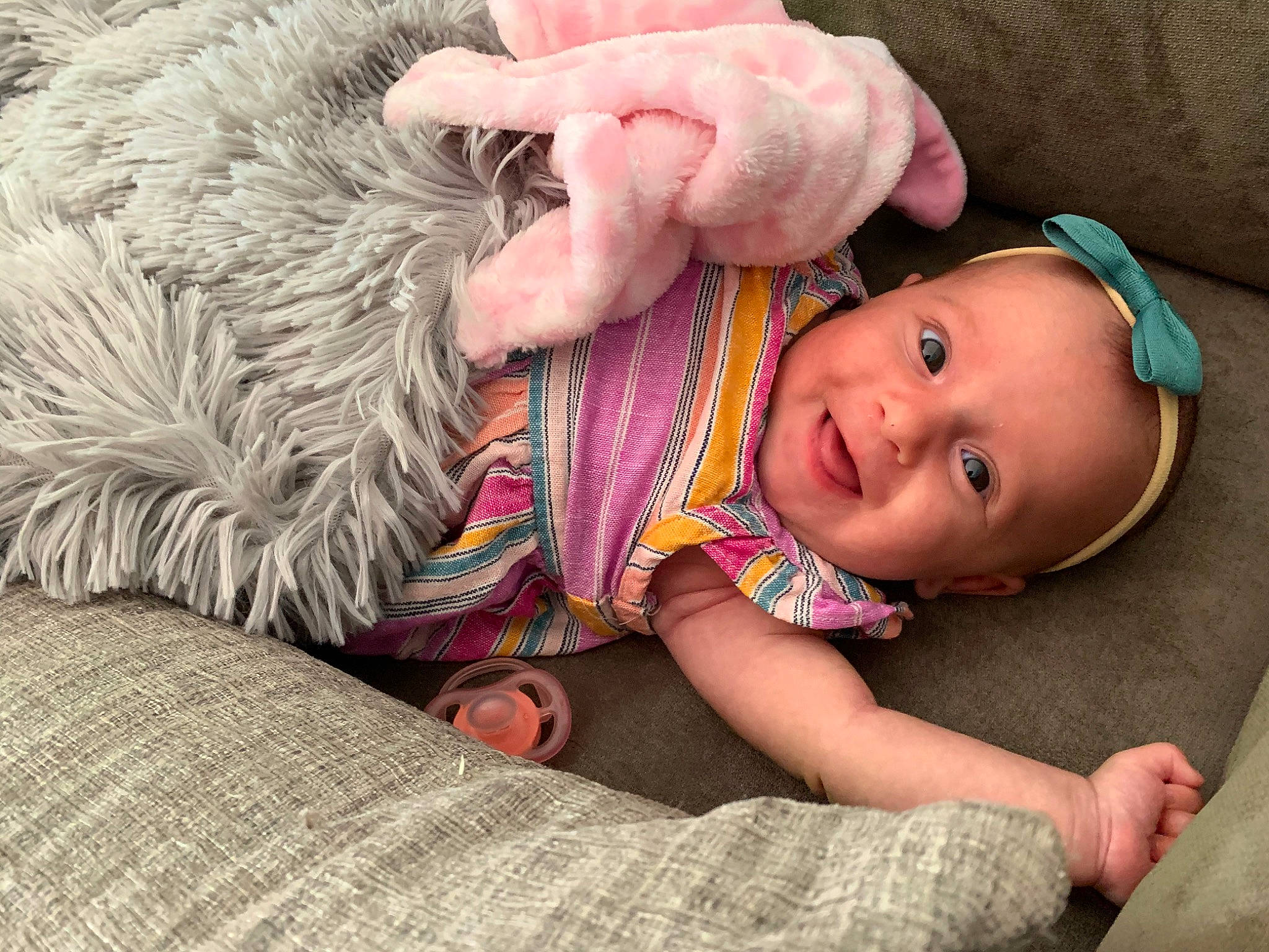 Ashlyn is registered to the contest to win money with this photo: baby, child, ear, eye, finger, fur, hand, human, leg, mouth, nap, person, pink, play, skin, sleep, toddler, wool