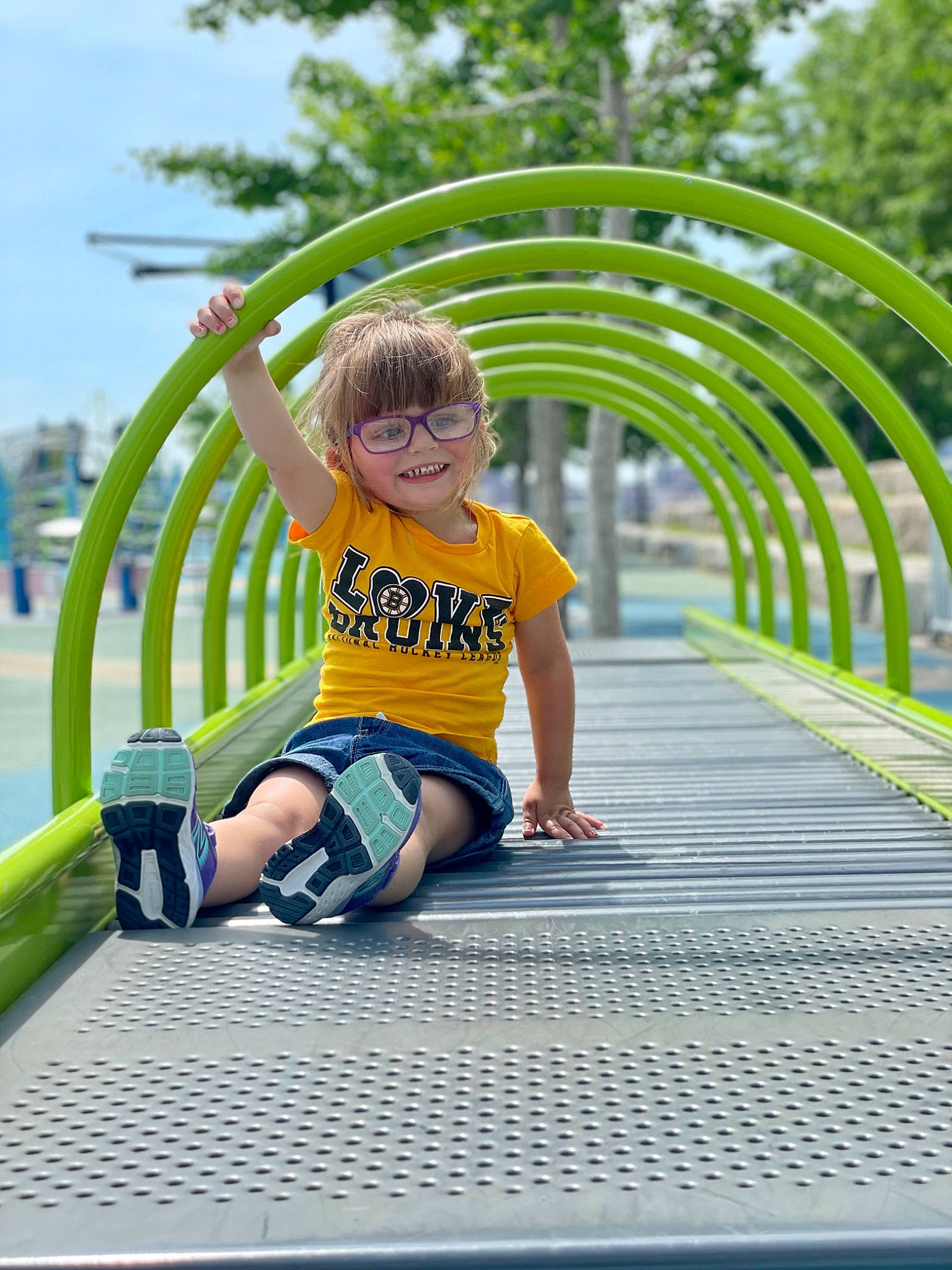 Sage joined the competition — help win amazing prizes! child, city, fun, grass, happy, joy, leg, leisure, mammal, people_in_nature, person, plant, recreation, shorts, sitting, sky, smile, t_shirt, toddler, travel