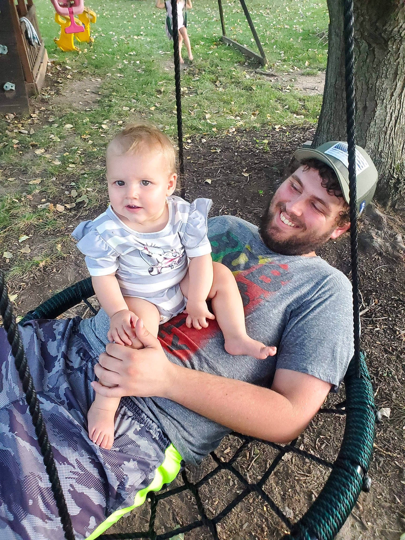 Megara joined the competition — help win amazing prizes! baby, child, event, fun, grass, happy, headwear, joy, lap, leisure, people_in_nature, person, play, recreation, sandal, sharing, shorts, sitting, smile, soil