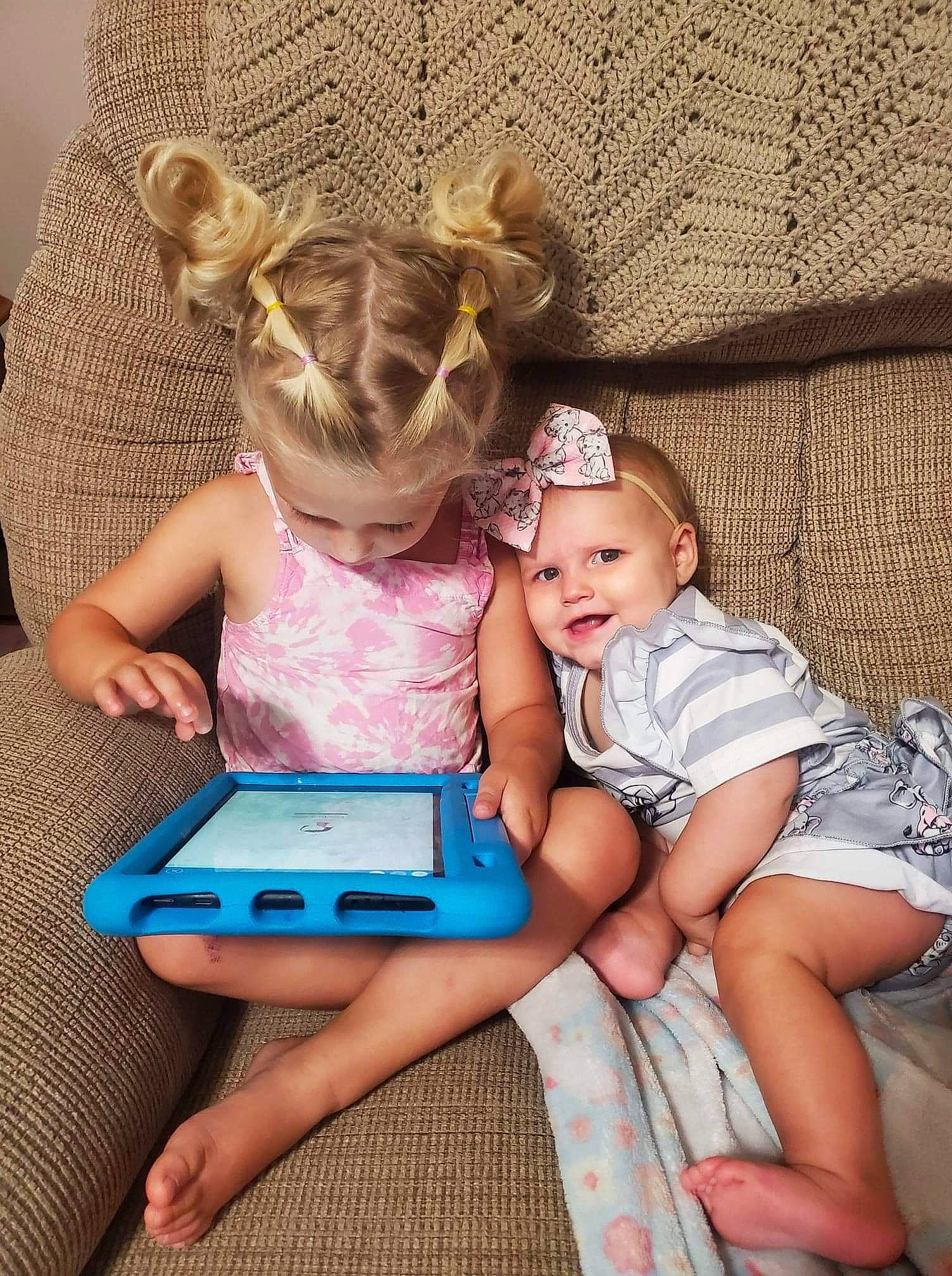 Megara joined the competition — help win amazing prizes! baby, baby_toddler_clothing, blond, child, comfort, communication_device, electronic_device, finger, fun, gadget, hand, happy, leisure, magenta, person, pink, sitting, t_shirt, tablet_computer, thigh
