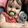 adorable, baby, car_seat, child, closeup, curly_hair, cute, dress, hand, infant, koala, pacifier, pink, plush_toy, portrait, sitting, skin, soft_toy, stuffed_animal, young