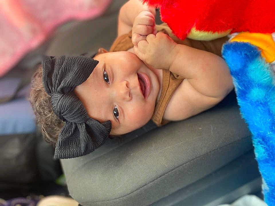 Octavia joined the competition — help win amazing prizes! baby, baby_products, child, eyelash, fashion_accessory, flash_photography, fun, fur, grass, happy, headwear, leisure, lip, person, plant, portrait_photography, sitting, skin, smile, textile