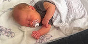 Maddison joined the competition — help win amazing prizes! baby, sleeping, crib, blanket, pacifier, infant, soft, quilted_bedding, peaceful, cozy, child, resting, cute, wrapped, indoors, newborn, comfort, toddler, clothing, nursery
