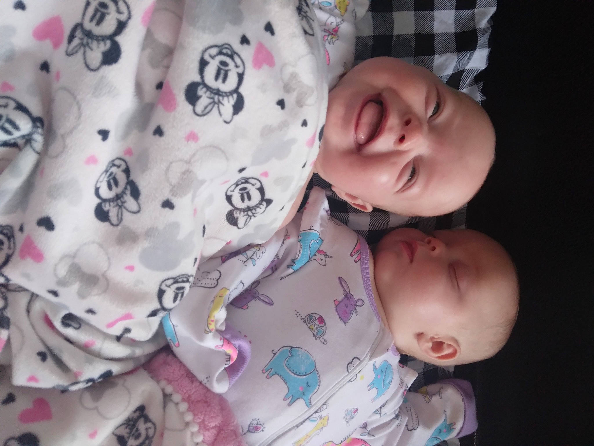 Katie is registered to the contest to win money with this photo: baby, baby_toddler_clothing, cheek, child, comfort, eye, eyebrow, finger, happy, iris, lip, mouth, neck, nose, pattern, person, pink, skin, sleeve, smile