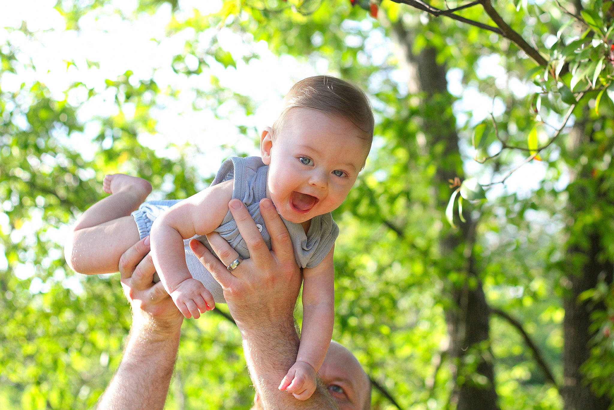Finley joined the competition — help win amazing prizes! baby, branch, child, finger, fun, gesture, grass, hand, happy, leaf, people_in_nature, person, photography, plant, smile, thumb, toddler, tree, vacation