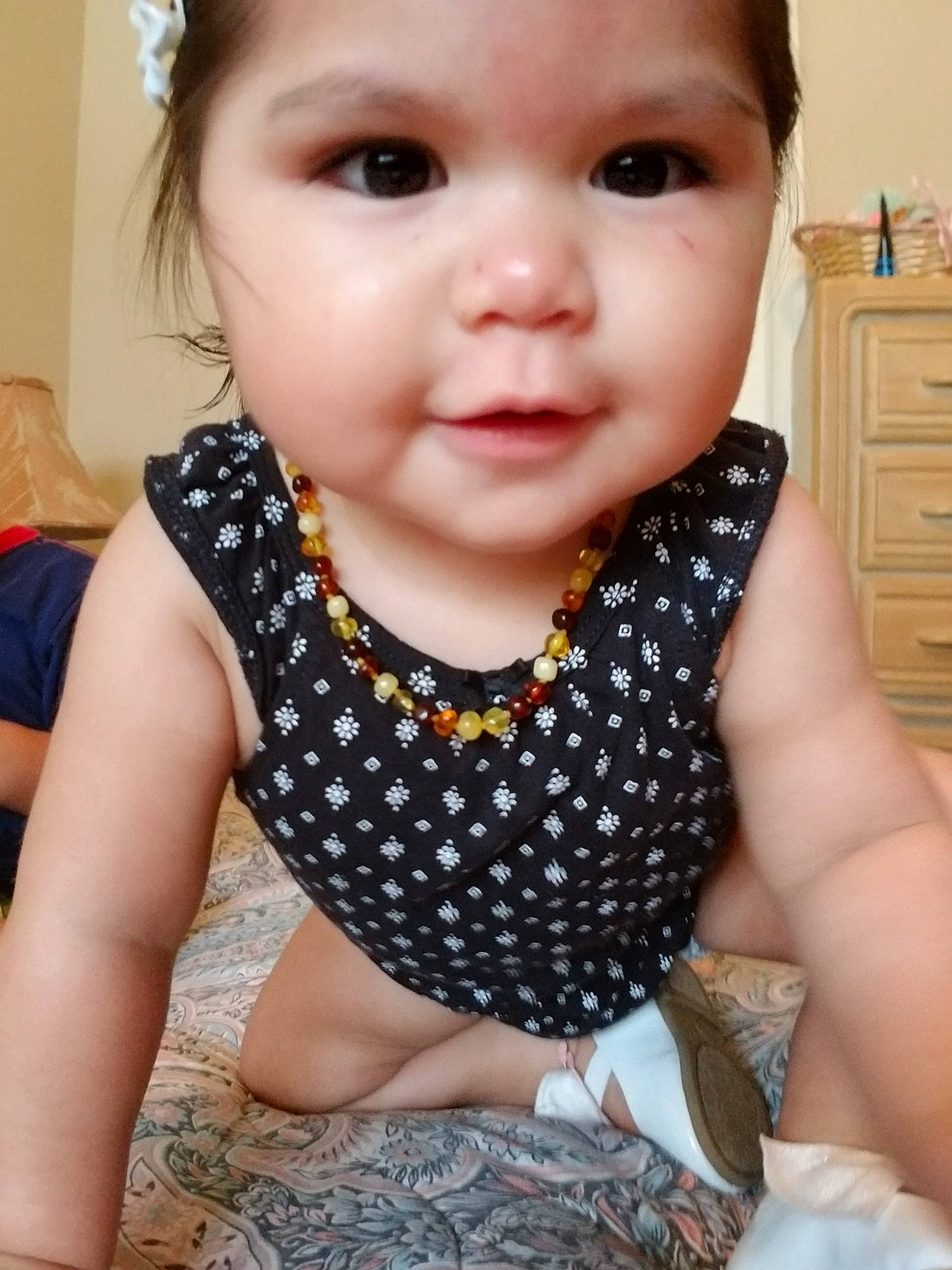 Annalise joined the competition — help win amazing prizes! baby, baby_toddler_clothing, cheek, child, child_model, design, face, head, lip, mouth, neck, nose, pattern, person, polka_dot, skin, smile, toddler