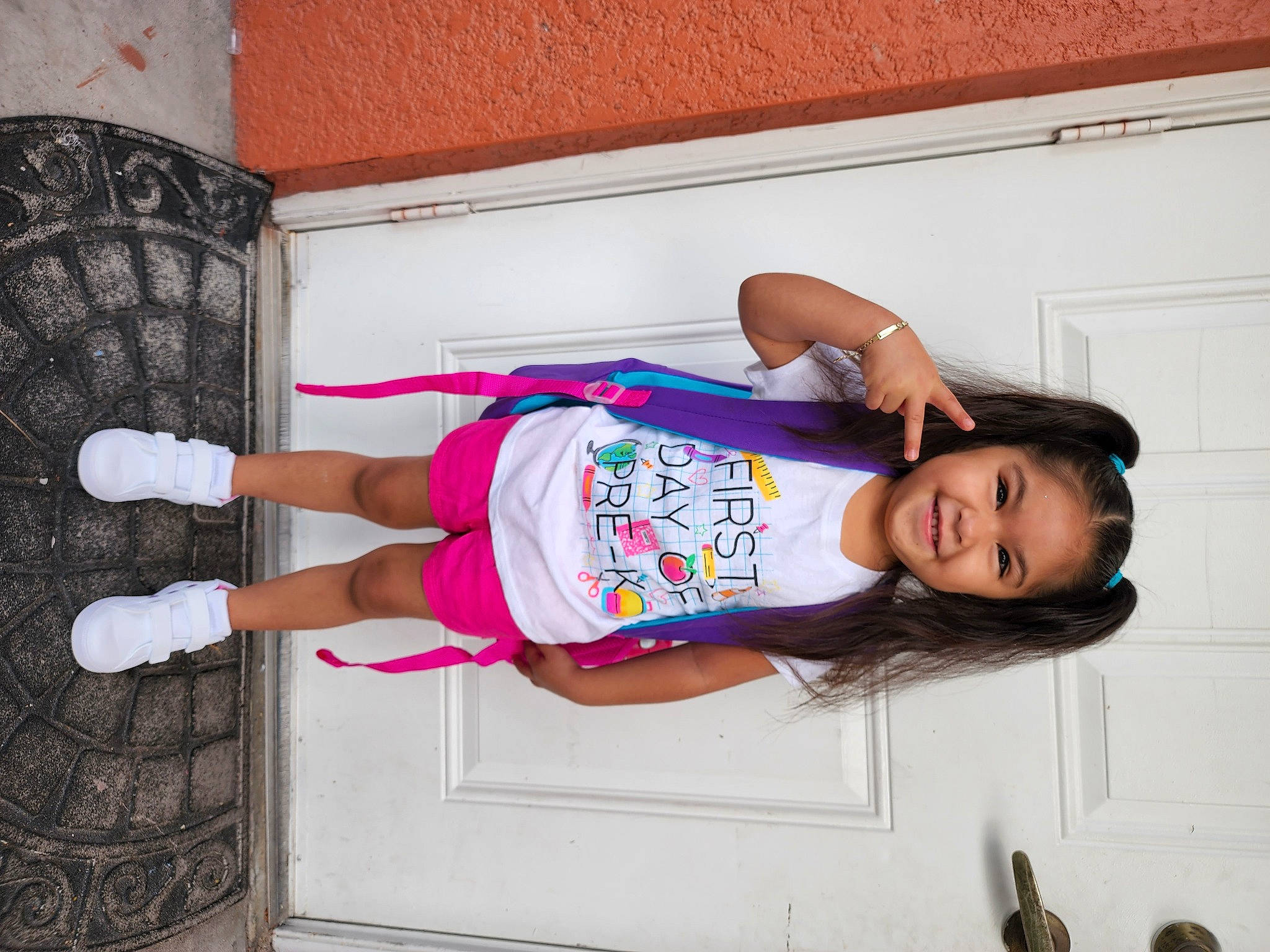 Annalise joined the competition — help win amazing prizes! abdomen, child, comfort, elbow, fun, happy, human_leg, joy, knee, magenta, pattern, person, room, sandal, sleeve, smile, sock, t_shirt, thigh, trunk