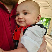 Ka'Marie joined the competition — help win amazing prizes! baby, child, infant, smiling, portrait, adult, beard, holding, carrier, red_clothing, white_clothing, black_clothing, indoor, outdoor, sunlight, window, greenery, family, close_up, photography