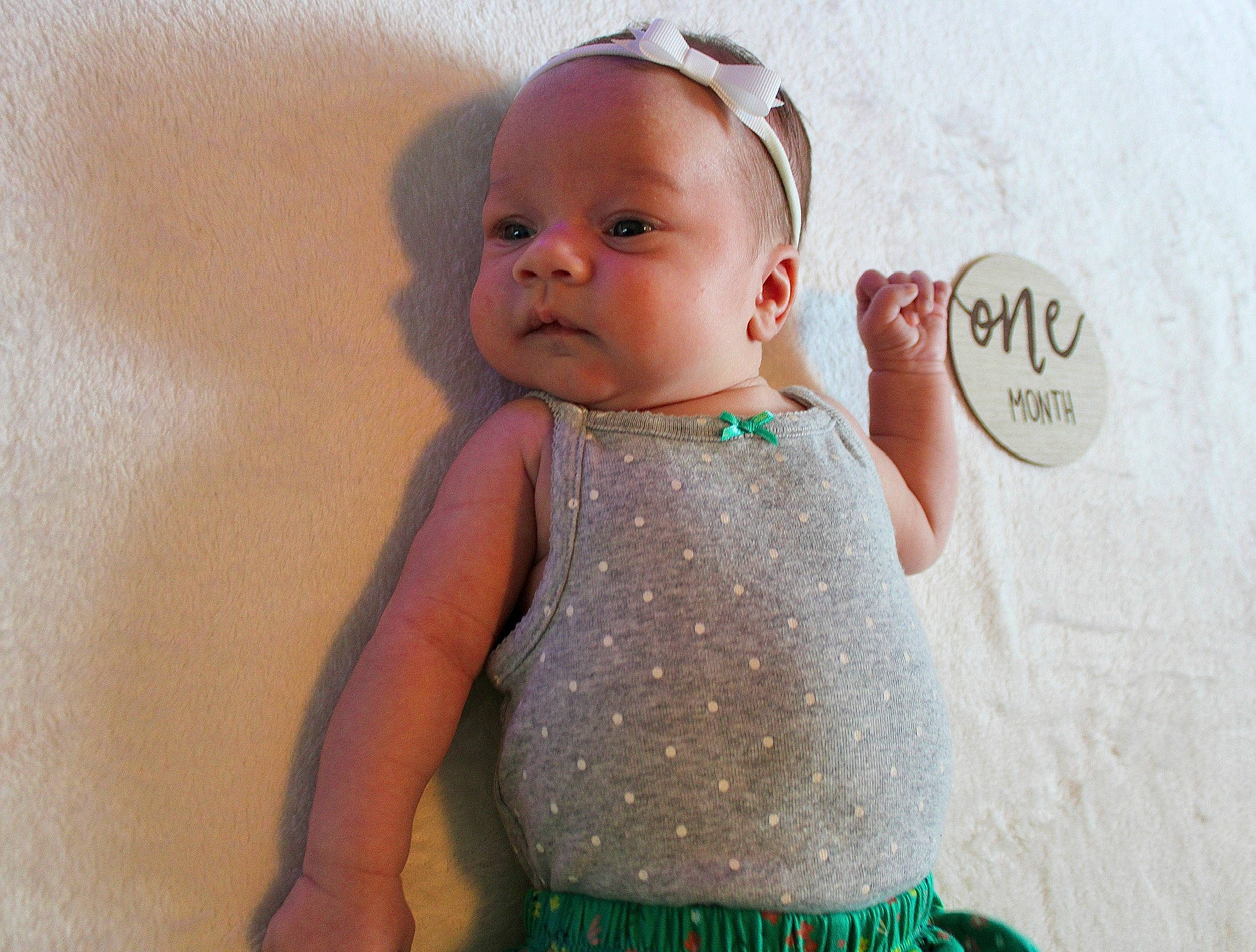 Ensleigh is registered to the contest to win money with this photo: arm, baby_toddler_clothing, cheek, dress, eye, eyelash, face, hair, hairstyle, hand, happy, head, lip, mouth, neck, nose, person, product, shoulder, skin