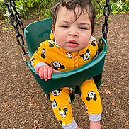 Royal joined the competition — help win amazing prizes! child, toddler, swing, playground, yellow_clothing, mickey_mouse, onesie, barefoot, green_swing, outdoor, mulch, hand, face, hair, expression, nature, park, cute, casual, daylight