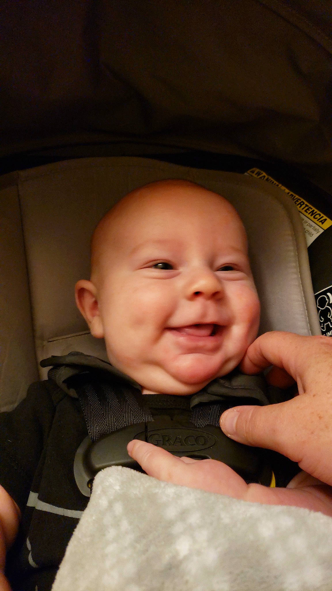 Blake is registered to the contest to win money with this photo: baby, cheek, child, chin, eye, face, facial_expression, finger, forehead, gesture, hand, head, lip, mouth, nose, person, photography, skin, smile, thumb