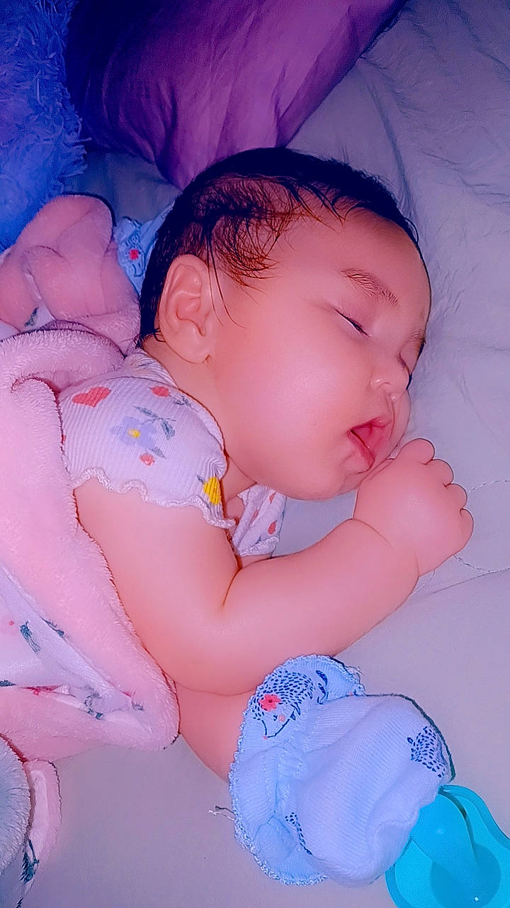 Ahri joined the competition — help win amazing prizes! azure, baby, baby_sleeping, baby_toddler_clothing, blue, cheek, child, comfort, facial_expression, finger, happy, iris, mouth, nose, pattern, person, pink, product, skin, textile