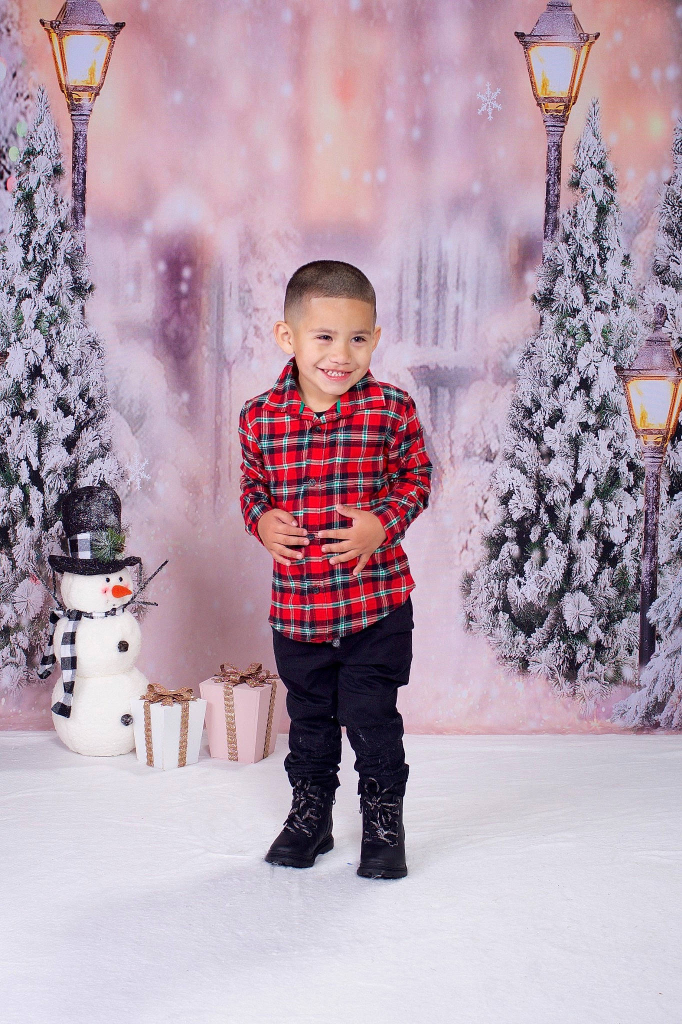Isaiah is registered to the contest to win money with this photo: christmas, christmas_decoration, christmas_eve, christmas_ornament, event, freezing, fun, happy, holiday, joy, lighting, ornament, pattern, person, plaid, sleeve, snow, standing, street_light, tree