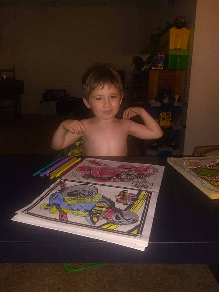 Abel is registered to the contest to win money with this photo: child, drawing, electronic_device, fun, games, person, play, technology, toddler, writing_implement