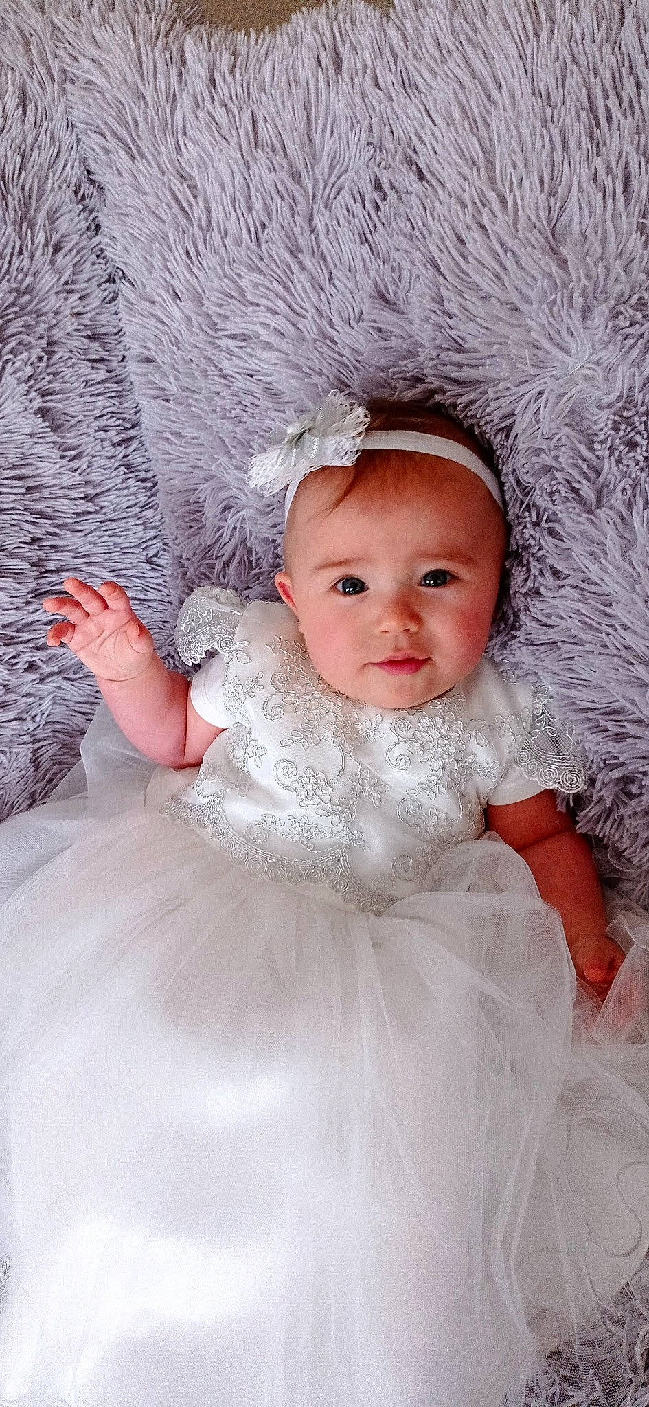 Gabrielle participe au concours pour gagner de l'argent avec cette photo : baby, baby_toddler_clothing, bridal_accessory, dress, embellishment, eye, face, facial_expression, flash_photography, hairstyle, happy, head, headpiece, headwear, iris, person, pink, skin, sleeve, textile