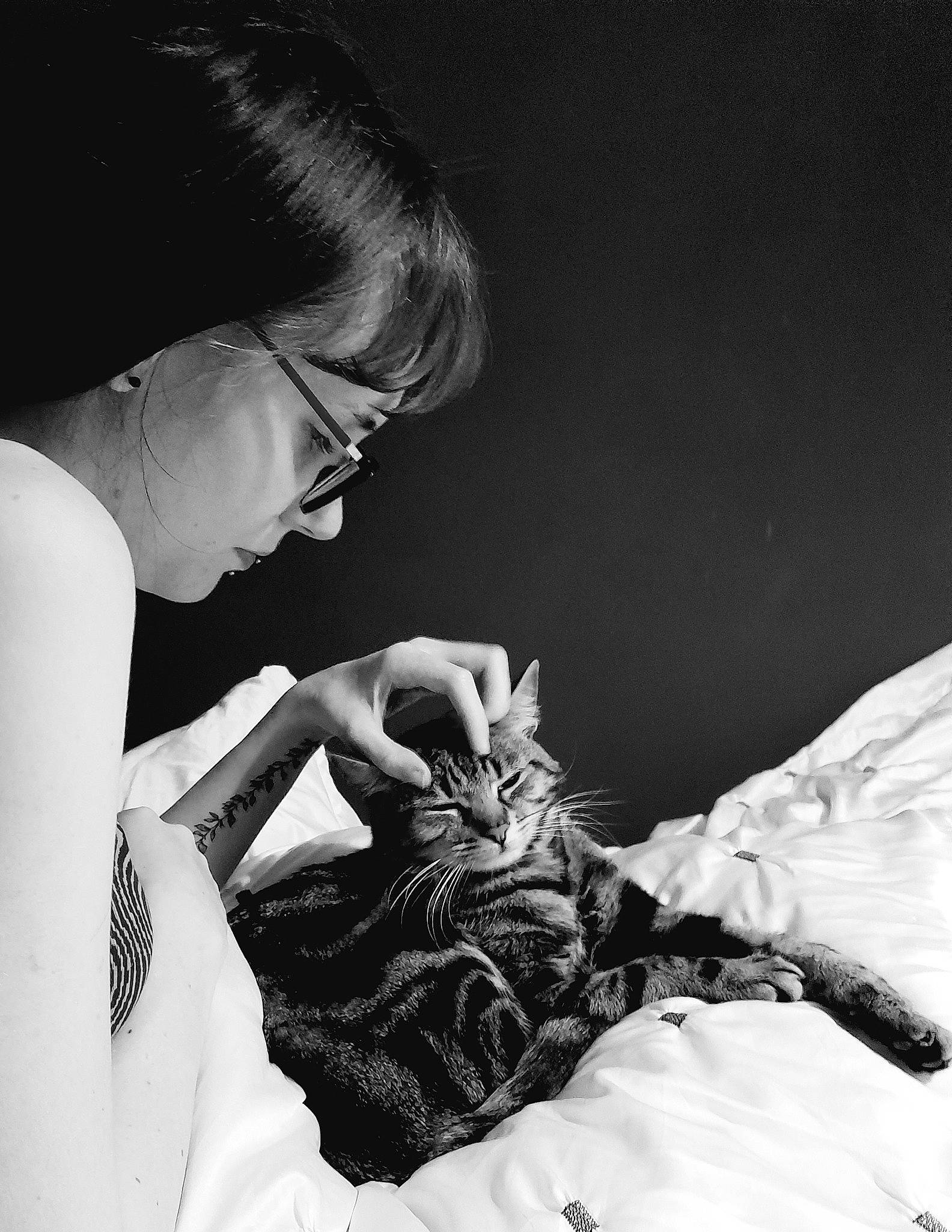 Cinnamon joined the competition — help win amazing prizes! bedding, black_and_white, comfort, dress, elbow, event, eyewear, fashion_design, flash_photography, gesture, glasses, happy, linens, mammal, monochrome, monochrome_photography, room, sitting, style, vision_care