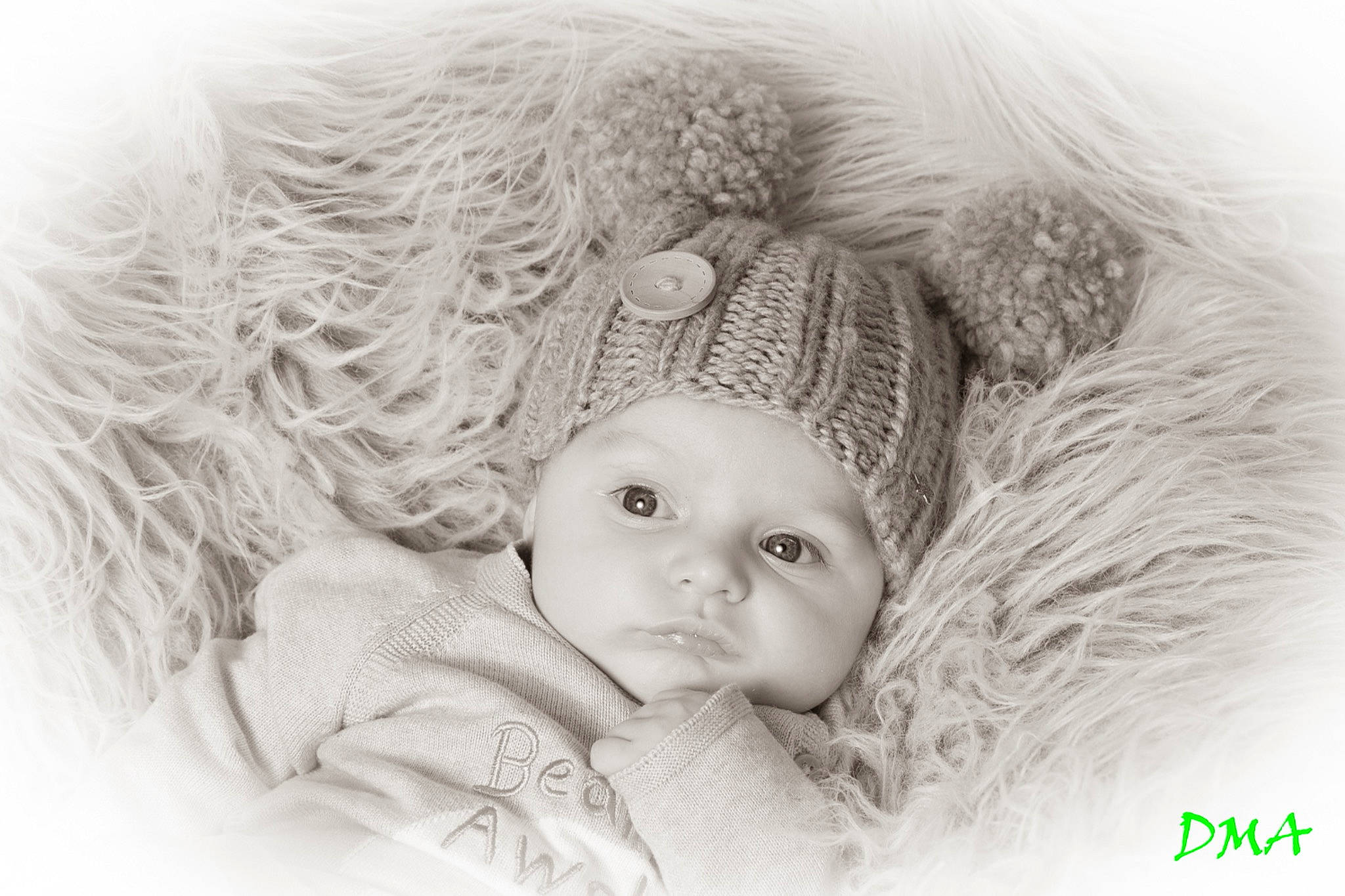 Coby is registered to the contest to win money with this photo: art, baby, baby_toddler_clothing, beanie, cap, comfort, eye, eyelash, fashion_accessory, fur, hair_accessory, happy, headpiece, headwear, knit_cap, linens, monochrome, monochrome_photography, person, picture_frame