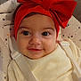 Marie Carmen a rejoint le concours — aidez-le/la à gagner de superbes lots ! baby, baby_seat, child, closeup, clothing, cute, eyes, face, happy, headband, indoor, infant, moons, pattern, portrait, red_bow, seat_belt, smile, stars, sweater