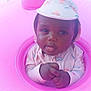 baby, child, infant, pink, inflatable, swim_ring, hat, clothing, face, hands, cute, water_toy, playful, summer, pool, outdoor, portrait, skin, expression, young