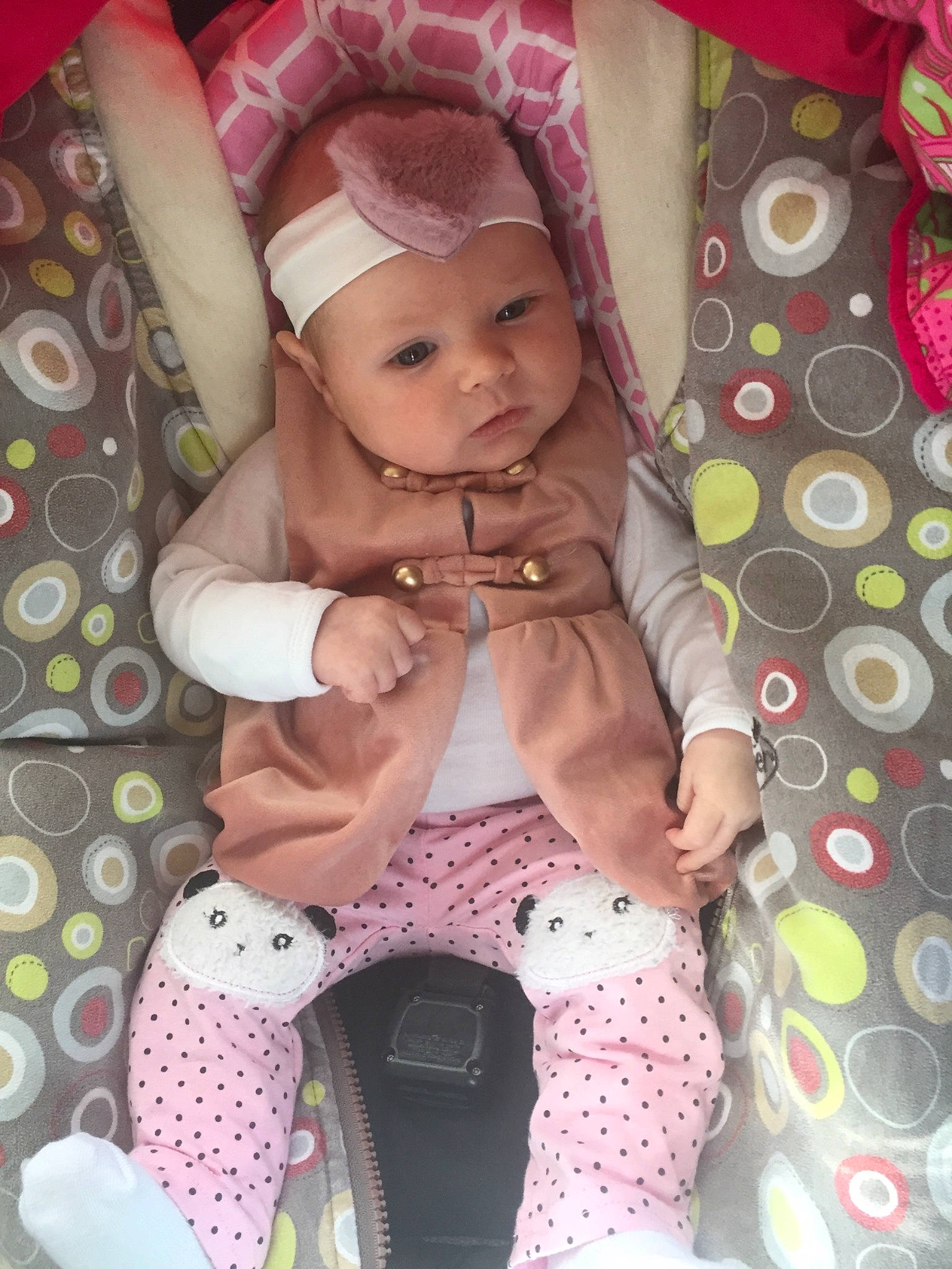 Kendra is registered to the contest to win money with this photo: baby, cheek, child, fawn, pattern, person, pink, polka_dot, product, skin, toddler